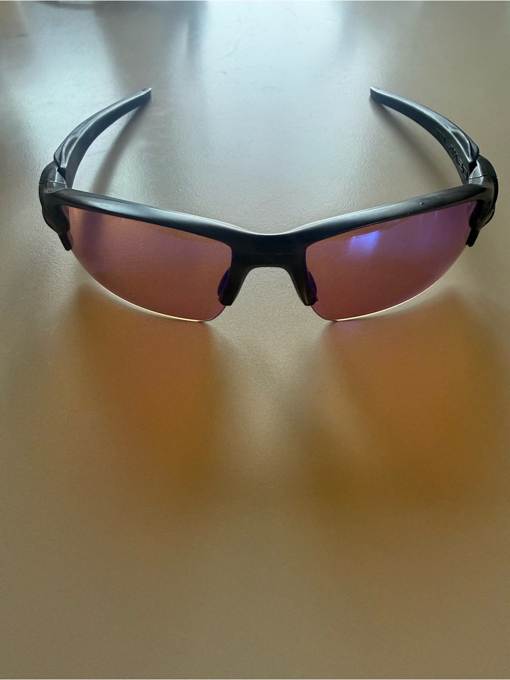Oakley Men's Black Frame Sunglasses with Purple Mirrored Lenses